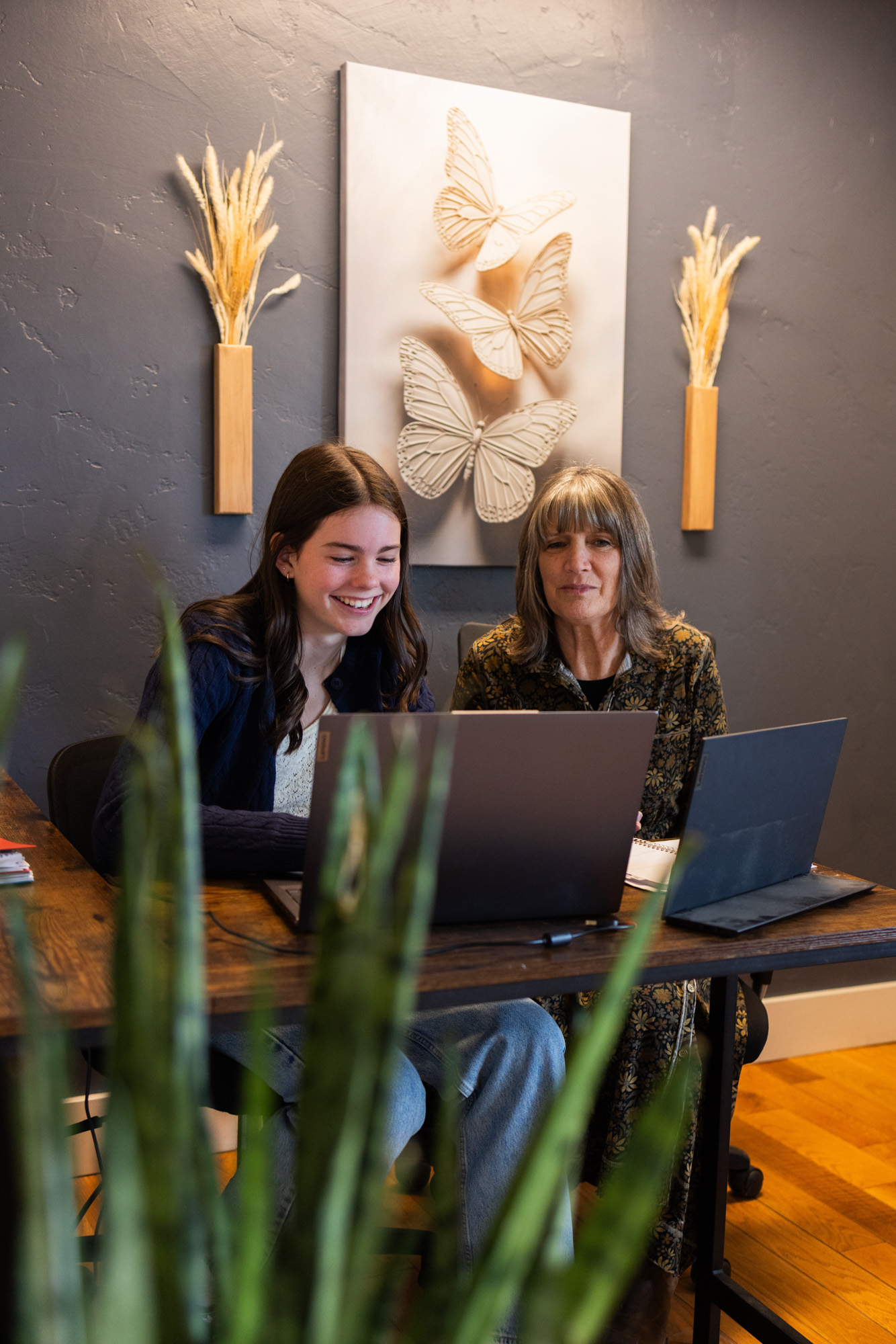 Image of Bookkeeping by Design employees, working on bookkeeping services such as QuickBooks, QuickBooks Online, Financial Reports, Account Management, and CPA Coordination for small business owners in Central Oregon.